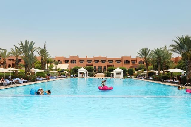 The outdoor pool at the Kenzi Menara Palace